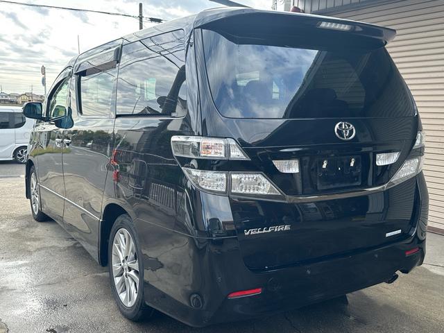 ヴェルファイア 2.4Z プラチナセレクションII 車検整備付き スマートキープッシュスタート リアエアコン 盗難防止システム 3列シート 衝突安全ボディ サイドエアバック 助手席エアバッグ パワーウィンドゥ パワーステアリング オットマン(26枚目)