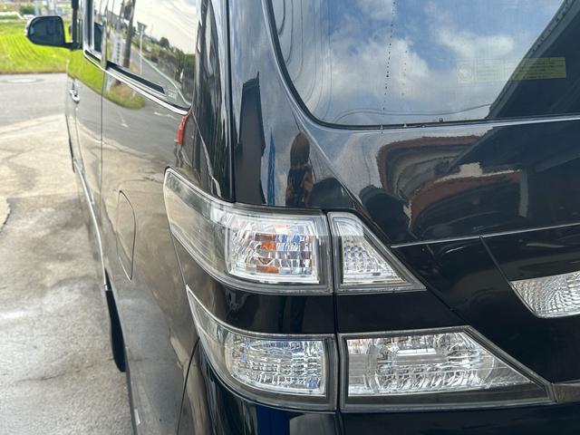 ヴェルファイア 2.4Z プラチナセレクションII 車検整備付き スマートキープッシュスタート リアエアコン 盗難防止システム 3列シート 衝突安全ボディ サイドエアバック 助手席エアバッグ パワーウィンドゥ パワーステアリング オットマン(27枚目)