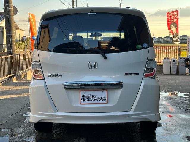 フリードスパイクハイブリッド ジャストセレクション　車検整備付き　Ｓキー　キーフリー　セキュリティーアラーム　横滑り防止機能　エアコン　フルフラットシート　パワーステアリング　クルーズコントロール　Ｉ－ＳＴＯＰ　パワーウィンドウ　運転席エアバッグ（8枚目）