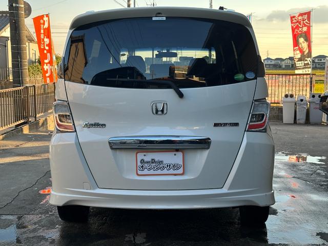 フリードスパイクハイブリッド ジャストセレクション　車検整備付き　Ｓキー　キーフリー　セキュリティーアラーム　横滑り防止機能　エアコン　フルフラットシート　パワーステアリング　クルーズコントロール　Ｉ－ＳＴＯＰ　パワーウィンドウ　運転席エアバッグ（9枚目）