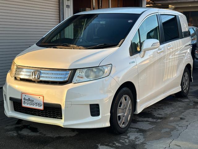 フリードスパイクハイブリッド ジャストセレクション　車検整備付き　Ｓキー　キーフリー　セキュリティーアラーム　横滑り防止機能　エアコン　フルフラットシート　パワーステアリング　クルーズコントロール　Ｉ－ＳＴＯＰ　パワーウィンドウ　運転席エアバッグ（21枚目）