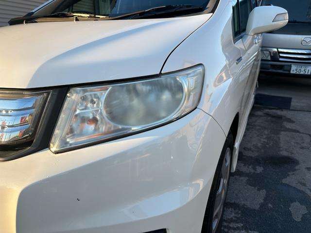 フリードスパイクハイブリッド ジャストセレクション　車検整備付き　Ｓキー　キーフリー　セキュリティーアラーム　横滑り防止機能　エアコン　フルフラットシート　パワーステアリング　クルーズコントロール　Ｉ－ＳＴＯＰ　パワーウィンドウ　運転席エアバッグ（22枚目）