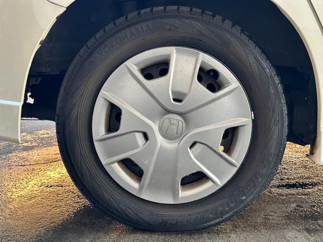 フリードスパイクハイブリッド ジャストセレクション　車検整備付き　Ｓキー　キーフリー　セキュリティーアラーム　横滑り防止機能　エアコン　フルフラットシート　パワーステアリング　クルーズコントロール　Ｉ－ＳＴＯＰ　パワーウィンドウ　運転席エアバッグ（45枚目）