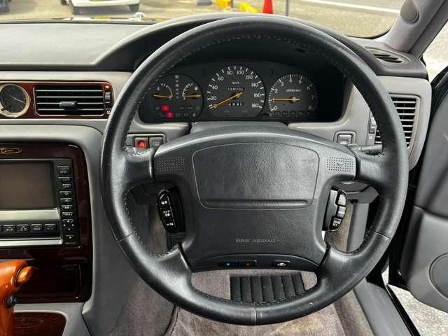 シーマ リミテッドS-four 4WD オートクルーズコントロール オートライト AT 電動格納ミラー パワーシート CD カセット ABS エアコン パワーステアリング(3枚目)