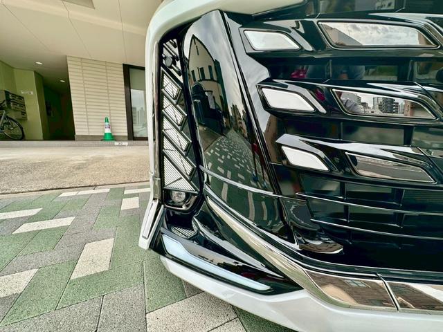ヴェルファイアハイブリッド Ｚ　プレミア　モデリスタ／車高調／ＷＡＬＤ２１インチＡＷ／キャリパーカバー／社外ＬＥＤデイライト・社外アンビエントライト／フットイルミネーション／サンルーフ／フリップダウンモニター／寒冷地仕様／ブラウン内装（50枚目）