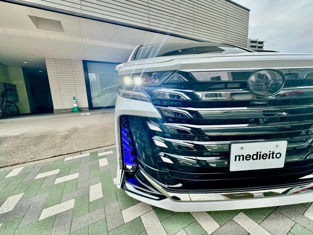 ヴェルファイアハイブリッド Ｚ　プレミア　モデリスタ／車高調／ＷＡＬＤ２１インチＡＷ／キャリパーカバー／社外ＬＥＤデイライト・社外アンビエントライト／フットイルミネーション／サンルーフ／フリップダウンモニター／寒冷地仕様／ブラウン内装（52枚目）