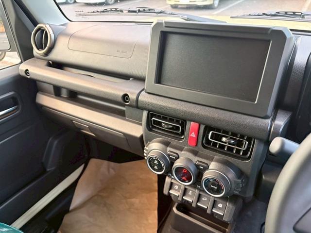 ジムニーノマド FC 5速MTモデル/登録済み未使用車/スズキレーダーセーフティ/シートヒーター/スマートキー/15インチ純正アルミ/シフォンアイボリーメタリック/ブラックルーフz/4WD(22枚目)