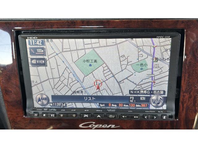 コペン タンレザーエディション　ＥＴＣ　ナビ　ＴＶ　キーレスエントリー　シートヒーター　ＡＴ　ＡＢＳ　電動オープンカー　革シート　アルミホイール　エアコン　パワーステアリング　パワーウィンドウ　ＭＯＭＯステアリング　スポイラー（5枚目）