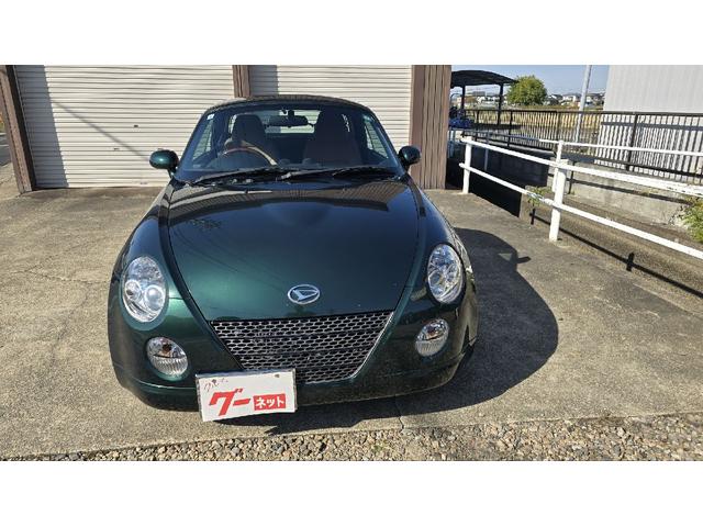 コペン タンレザーエディション　ＥＴＣ　ナビ　ＴＶ　キーレスエントリー　シートヒーター　ＡＴ　ＡＢＳ　電動オープンカー　革シート　アルミホイール　エアコン　パワーステアリング　パワーウィンドウ　ＭＯＭＯステアリング　スポイラー（12枚目）