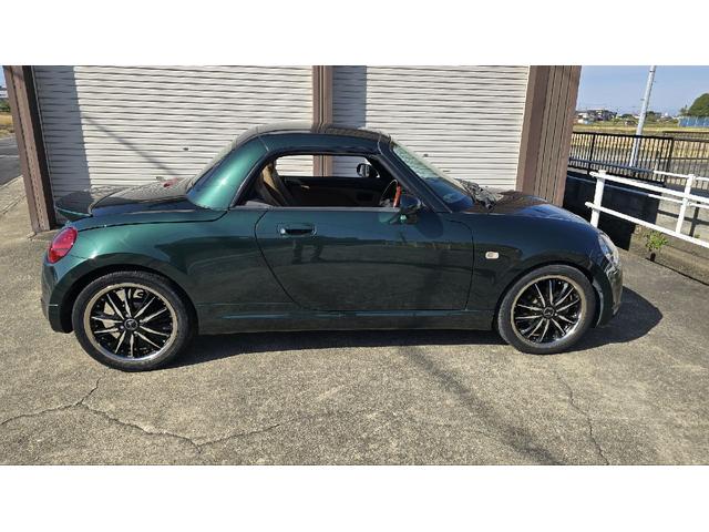 コペン タンレザーエディション　ＥＴＣ　ナビ　ＴＶ　キーレスエントリー　シートヒーター　ＡＴ　ＡＢＳ　電動オープンカー　革シート　アルミホイール　エアコン　パワーステアリング　パワーウィンドウ　ＭＯＭＯステアリング　スポイラー（14枚目）