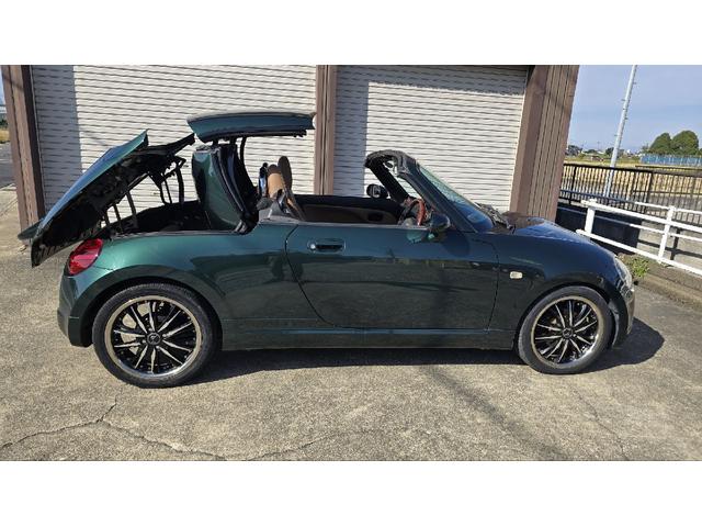 コペン タンレザーエディション　ＥＴＣ　ナビ　ＴＶ　キーレスエントリー　シートヒーター　ＡＴ　ＡＢＳ　電動オープンカー　革シート　アルミホイール　エアコン　パワーステアリング　パワーウィンドウ　ＭＯＭＯステアリング　スポイラー（15枚目）