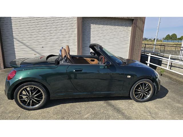 コペン タンレザーエディション　ＥＴＣ　ナビ　ＴＶ　キーレスエントリー　シートヒーター　ＡＴ　ＡＢＳ　電動オープンカー　革シート　アルミホイール　エアコン　パワーステアリング　パワーウィンドウ　ＭＯＭＯステアリング　スポイラー（16枚目）