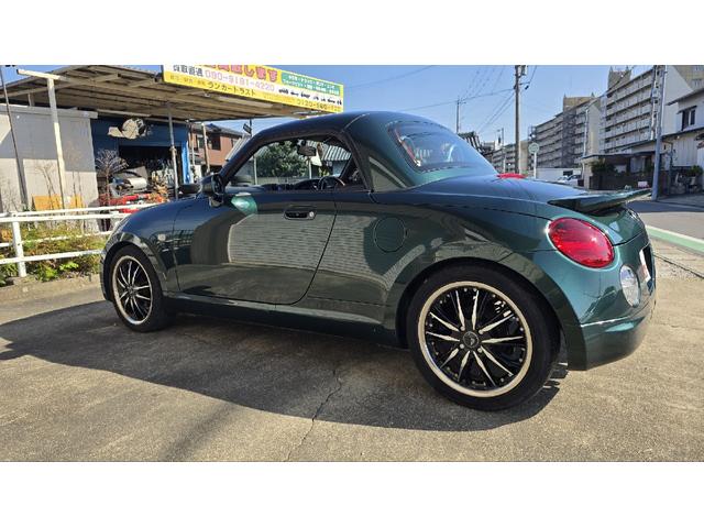 コペン タンレザーエディション　ＥＴＣ　ナビ　ＴＶ　キーレスエントリー　シートヒーター　ＡＴ　ＡＢＳ　電動オープンカー　革シート　アルミホイール　エアコン　パワーステアリング　パワーウィンドウ　ＭＯＭＯステアリング　スポイラー（18枚目）