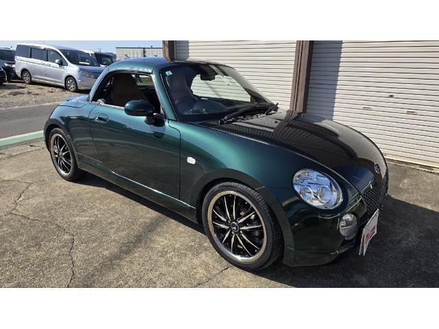 コペン タンレザーエディション　ＥＴＣ　ナビ　ＴＶ　キーレスエントリー　シートヒーター　ＡＴ　ＡＢＳ　電動オープンカー　革シート　アルミホイール　エアコン　パワーステアリング　パワーウィンドウ　ＭＯＭＯステアリング　スポイラー（21枚目）