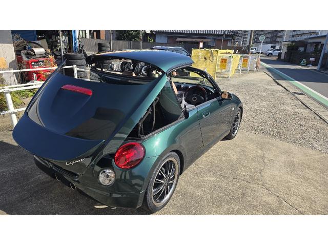 コペン タンレザーエディション　ＥＴＣ　ナビ　ＴＶ　キーレスエントリー　シートヒーター　ＡＴ　ＡＢＳ　電動オープンカー　革シート　アルミホイール　エアコン　パワーステアリング　パワーウィンドウ　ＭＯＭＯステアリング　スポイラー（25枚目）