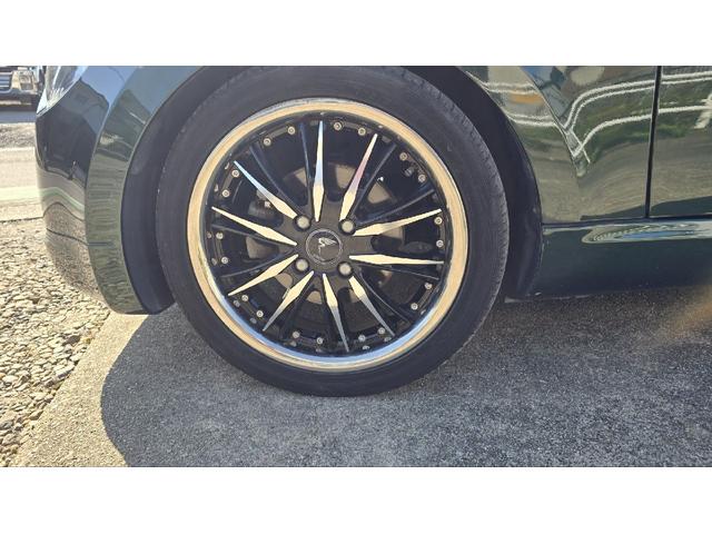 コペン タンレザーエディション　ＥＴＣ　ナビ　ＴＶ　キーレスエントリー　シートヒーター　ＡＴ　ＡＢＳ　電動オープンカー　革シート　アルミホイール　エアコン　パワーステアリング　パワーウィンドウ　ＭＯＭＯステアリング　スポイラー（31枚目）