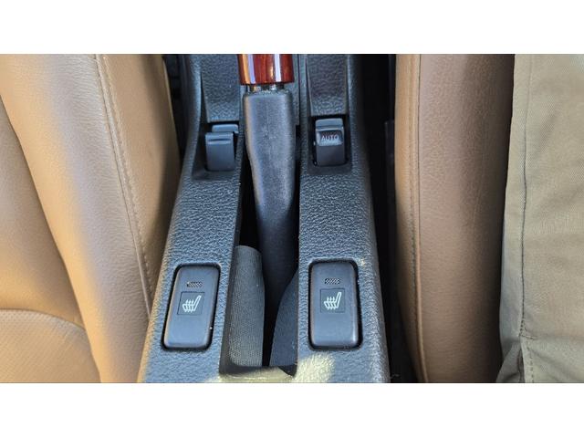 コペン タンレザーエディション　ＥＴＣ　ナビ　ＴＶ　キーレスエントリー　シートヒーター　ＡＴ　ＡＢＳ　電動オープンカー　革シート　アルミホイール　エアコン　パワーステアリング　パワーウィンドウ　ＭＯＭＯステアリング　スポイラー（39枚目）