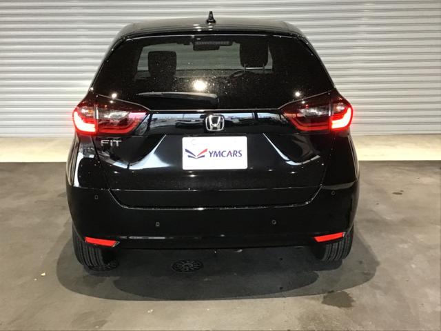 フィット ホーム 衝突軽減 ソナー AAC 横滑り防止機能 サイドエアバック 衝突安全ボディ LEDライト クルーズコントロール パワーウィンドウ スマキー パワーステアリング ABS 盗難防止システム レーンキープ(7枚目)
