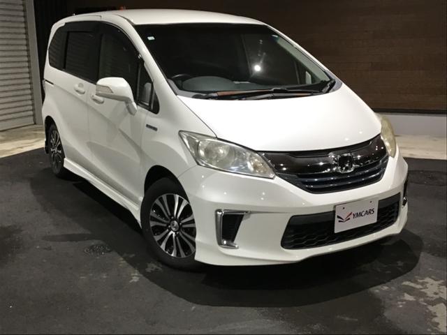 フリードハイブリッド ジャストセレクション セキュリティー 横滑り防止機能 オートクルーズ エアバック ウォークスルー キーレスエントリー PS ETC フルオートエアコン ABS パワーウィンドウ 運転席助手席エアバック(2枚目)