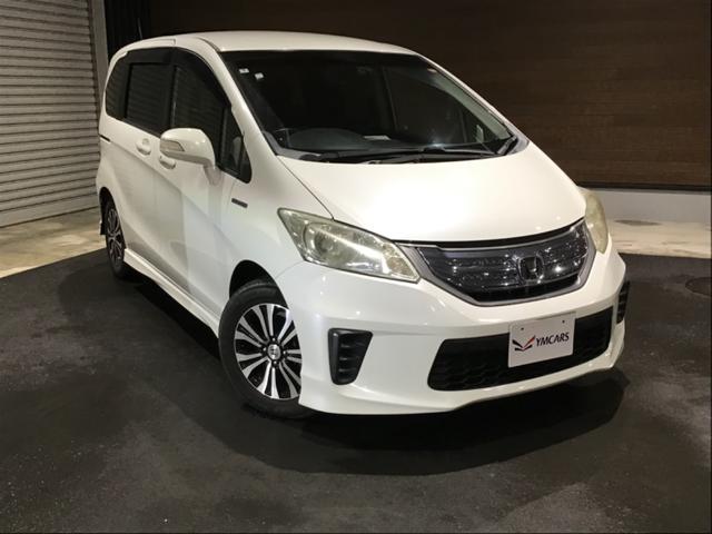 フリードハイブリッド ジャストセレクション セキュリティー 横滑り防止機能 衝突安全ボディ オートクルーズ エアバック ウォークスルー キーレスエントリー PS フルオートエアコン ABS パワーウィンドウ 運転席助手席エアバック(2枚目)