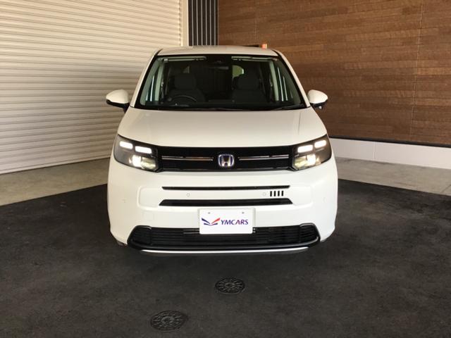 フリード ｅ：ＨＥＶエアー　ＥＸ　衝突軽減システム　ソナー　オートマチックハイビーム　横滑り防止装置　クルーズコントロール　サイドカーテンエアバック　リアクーラー　ＬＥＤランプ　レーンキープ　シートヒーター　キーレス　オートライト（2枚目）