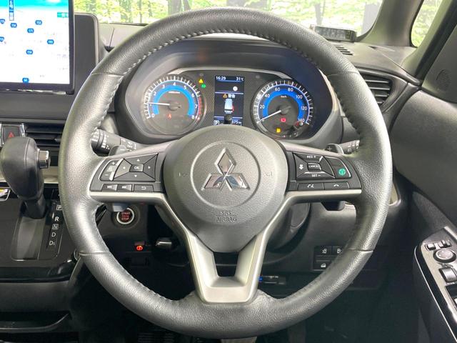 デリカミニ Ｔ　プレミアム　４ＷＤ　両側電動ドア　１０型ＳＤナビ　全周囲カメラ　衝突軽減　レーダークルーズ　禁煙車　ハーフレザーシート　コーナーセンサー　スマートキー　シートヒーター　ＬＥＤヘッド　ビルトインＥＴＣ　フルセグＴＶ（11枚目）