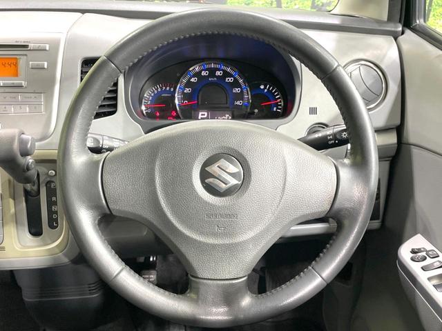 ワゴンR FXリミテッドII 特別仕様車 禁煙車 スマートキー ビルトインETC オートエアコン 純正14インチアルミ 電動格納ドアミラー 革巻きステアリング セキュリティーアラーム 運転席シートリフター CD再生/6スピーカー(11枚目)