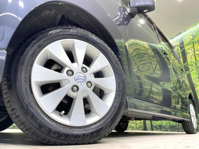 ワゴンR FXリミテッドII 特別仕様車 禁煙車 スマートキー ビルトインETC オートエアコン 純正14インチアルミ 電動格納ドアミラー 革巻きステアリング セキュリティーアラーム 運転席シートリフター CD再生/6スピーカー(13枚目)