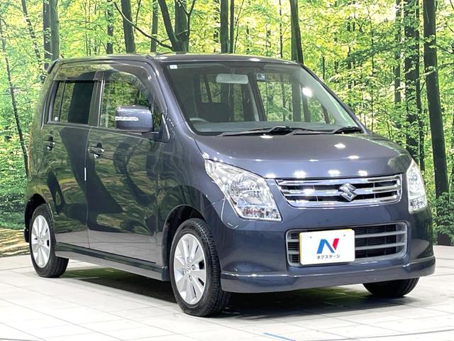 ワゴンR FXリミテッドII 特別仕様車 禁煙車 スマートキー ビルトインETC オートエアコン 純正14インチアルミ 電動格納ドアミラー 革巻きステアリング セキュリティーアラーム 運転席シートリフター CD再生/6スピーカー(16枚目)