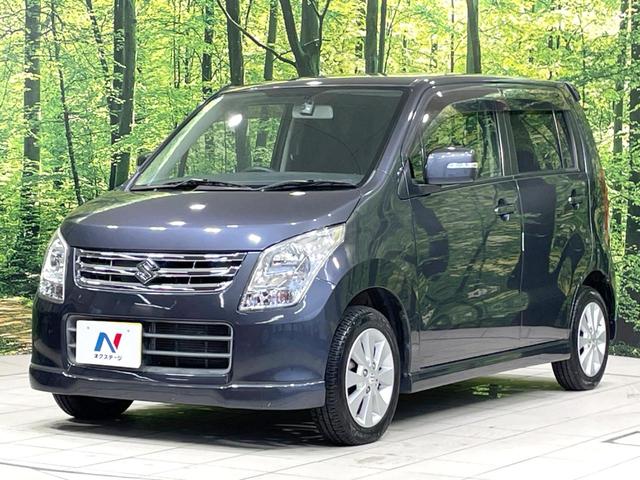 ワゴンR FXリミテッドII 特別仕様車 禁煙車 スマートキー ビルトインETC オートエアコン 純正14インチアルミ 電動格納ドアミラー 革巻きステアリング セキュリティーアラーム 運転席シートリフター CD再生/6スピーカー(24枚目)