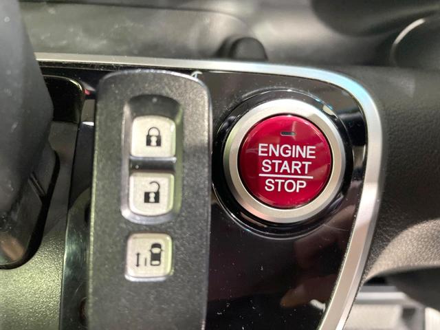 N-BOXカスタム G SSパッケージ 禁煙車 電動スライドドア SDナビ スマートキー シートヒーター HIDヘッド ビルトインETC オートライト オートエアコン 純正14インチアルミ Bluetooth DVD フルセグ LEDフォグ(7枚目)