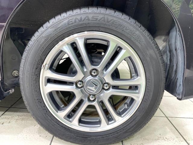 N-BOXカスタム G SSパッケージ 禁煙車 電動スライドドア SDナビ スマートキー シートヒーター HIDヘッド ビルトインETC オートライト オートエアコン 純正14インチアルミ Bluetooth DVD フルセグ LEDフォグ(23枚目)