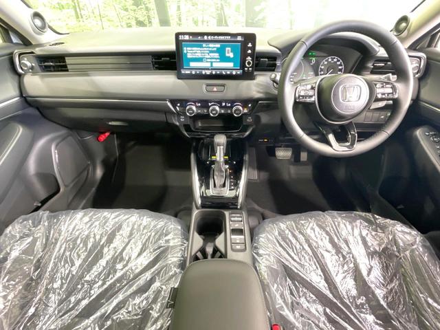 ヴェゼル e:HEV Z 登録済未使用車 衝突軽減 純正9型ナビ 全周囲カメラ ETC アダプティブクルーズ シートヒーター パワーバックドア コーナーセンサー ステアリングヒーター ブラインドスポットモニター(2枚目)