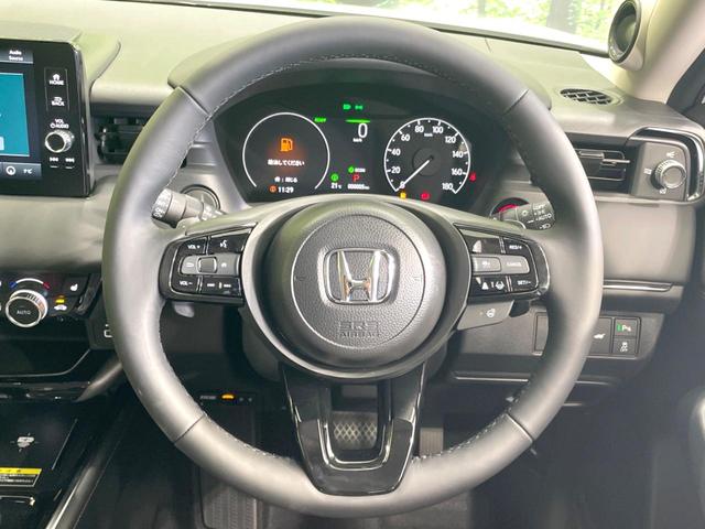 ヴェゼル e:HEV Z 登録済未使用車 衝突軽減 純正9型ナビ 全周囲カメラ ETC アダプティブクルーズ シートヒーター パワーバックドア コーナーセンサー ステアリングヒーター ブラインドスポットモニター(11枚目)