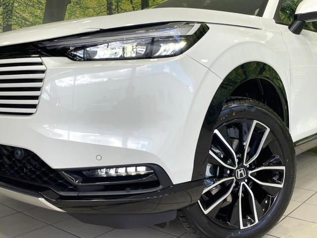 ヴェゼル e:HEV Z 登録済未使用車 衝突軽減 純正9型ナビ 全周囲カメラ ETC アダプティブクルーズ シートヒーター パワーバックドア コーナーセンサー ステアリングヒーター ブラインドスポットモニター(12枚目)