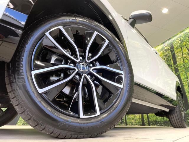 ヴェゼル e:HEV Z 登録済未使用車 衝突軽減 純正9型ナビ 全周囲カメラ ETC アダプティブクルーズ シートヒーター パワーバックドア コーナーセンサー ステアリングヒーター ブラインドスポットモニター(13枚目)