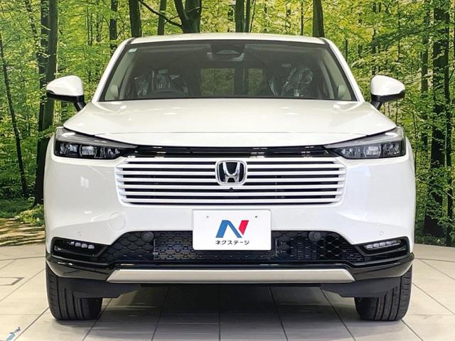 ヴェゼル e:HEV Z 登録済未使用車 衝突軽減 純正9型ナビ 全周囲カメラ ETC アダプティブクルーズ シートヒーター パワーバックドア コーナーセンサー ステアリングヒーター ブラインドスポットモニター(14枚目)