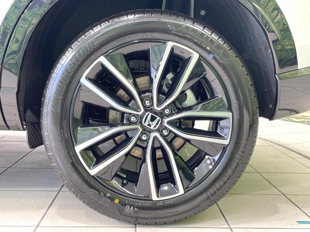 ヴェゼル e:HEV Z 登録済未使用車 衝突軽減 純正9型ナビ 全周囲カメラ ETC アダプティブクルーズ シートヒーター パワーバックドア コーナーセンサー ステアリングヒーター ブラインドスポットモニター(24枚目)