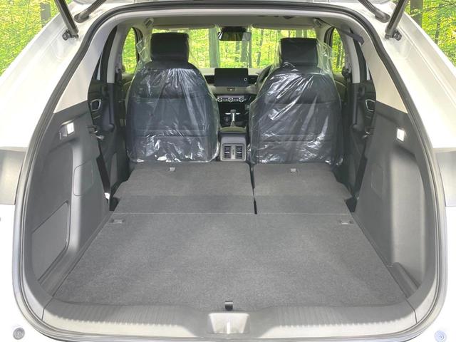 ヴェゼル e:HEV Z 登録済未使用車 衝突軽減 純正9型ナビ 全周囲カメラ ETC アダプティブクルーズ シートヒーター パワーバックドア コーナーセンサー ステアリングヒーター ブラインドスポットモニター(64枚目)