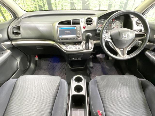 ストリーム RSZ 禁煙車 純正ナビ バックカメラ ETC HIDヘッド フロントフォグ オートライト オートエアコン 純正17インチアルミ CD DVD再生 パドルシフト ステアリングスイッチ プライバシーガラス(2枚目)