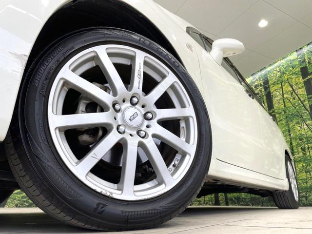 ストリーム RSZ 禁煙車 純正ナビ バックカメラ ETC HIDヘッド フロントフォグ オートライト オートエアコン 純正17インチアルミ CD DVD再生 パドルシフト ステアリングスイッチ プライバシーガラス(14枚目)