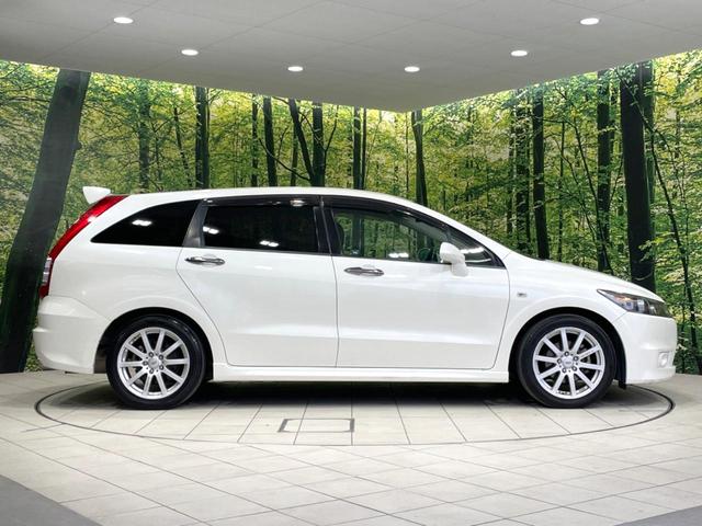 ストリーム RSZ 禁煙車 純正ナビ バックカメラ ETC HIDヘッド フロントフォグ オートライト オートエアコン 純正17インチアルミ CD DVD再生 パドルシフト ステアリングスイッチ プライバシーガラス(32枚目)