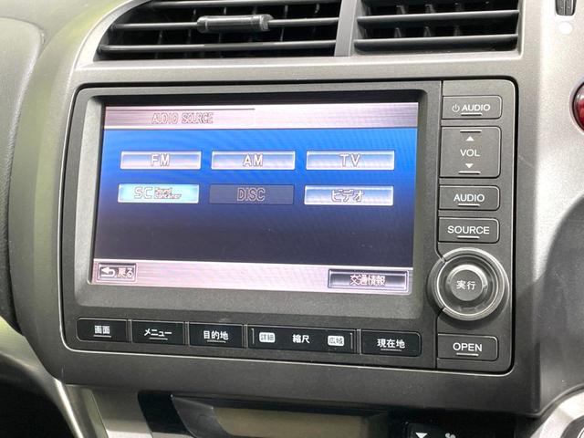 ストリーム RSZ 禁煙車 純正ナビ バックカメラ ETC HIDヘッド フロントフォグ オートライト オートエアコン 純正17インチアルミ CD DVD再生 パドルシフト ステアリングスイッチ プライバシーガラス(33枚目)