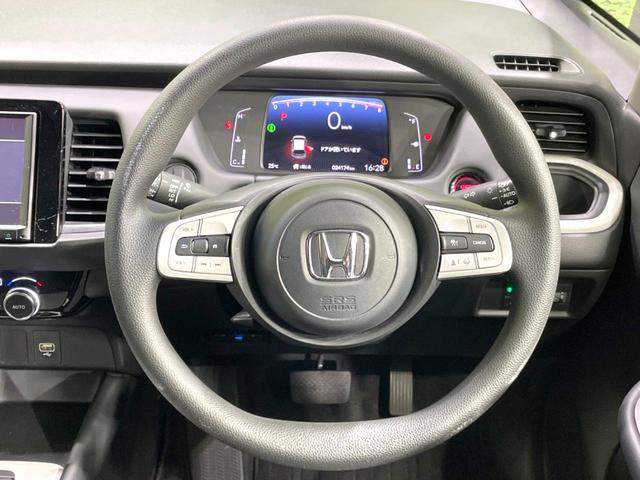 フィット ホーム　純正ＳＤナビ　バックカメラ　衝突被害軽減システム　レーダークルーズ　禁煙車　ハーフレザーシート　ドラレコ　コーナーセンサー　スマートキー　ＬＥＤヘッド　ビルトインＥＴＣ　オートハイビーム（11枚目）