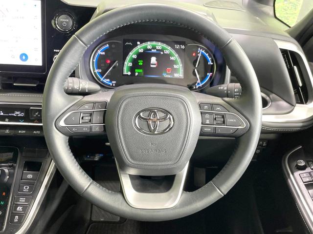 ノア ハイブリッドＳ－Ｚ　禁煙車　後席モニター　両側電動ドア　衝突軽減　純正１０．５型ディスプレイ　バックカメラ　ＥＴＣ　レーダークルーズ　コーナーセンサー　シートヒーター　車線逸脱警報　ＬＥＤヘッド　オートライト　フルセグ（12枚目）