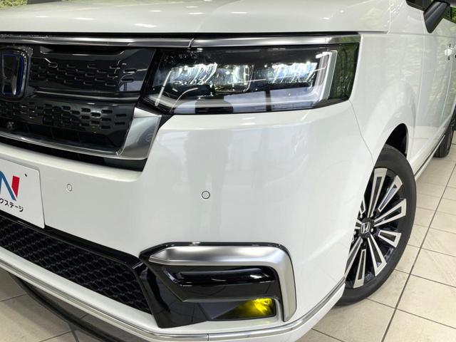 ステップワゴン ｅ：ＨＥＶスパーダ　プレミアムライン　禁煙車　純正１１型ナビ　両側電動ドア　全周囲カメラ　ホンダセンシング　ドラレコ　ＥＴＣ　アダプティブクルーズ　電動リアゲート　ハーフレザーシート　シートヒーター　コーナーセンサー　ＬＥＤヘッド（13枚目）