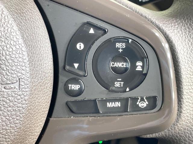 N-BOX G・Lホンダセンシング 禁煙車 電動スライドドア SDナビ バックカメラ 衝突軽減 アダプティブクルーズ コーナーセンサー スマートキー LEDヘッド ビルトインETC 純正14インチアルミ 車線逸脱警報 オートライト(7枚目)