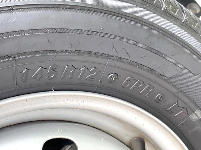 ハイゼットトラック スタンダード　禁煙車　純正オーディオ　ドアバイザー　パワーステアリング　衝突安全ボディ　ヘッドライトレベライザー　３方開荷台　荷台ステップ（25枚目）