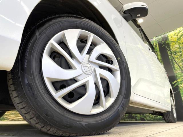 フリード Ｇ・ホンダセンシング　両側電動ドア　純正ＳＤナビ　バックカメラ　寒冷地仕様　衝突被害軽減システム　禁煙車　コーナーセンサー　スマートキー　ＬＥＤヘッド　ビルトインＥＴＣ　オートハイビーム　車線逸脱警報　オートライト（14枚目）