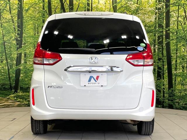 フリード Ｇ・ホンダセンシング　両側電動ドア　純正ＳＤナビ　バックカメラ　寒冷地仕様　衝突被害軽減システム　禁煙車　コーナーセンサー　スマートキー　ＬＥＤヘッド　ビルトインＥＴＣ　オートハイビーム　車線逸脱警報　オートライト（16枚目）